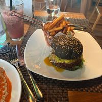 mint watermelon juice and black burger  at TIME Vegetarian Kitchen in Santo Domingo