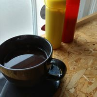 black coffee and ketchup  at Grumpy Panda Slice Shop & Deli in Gateshead