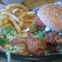 Frickin chickin burger with fries and slaw  at Grumpy Panda Slice Shop & Deli in Gateshead