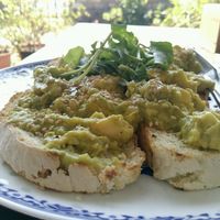 avocado on toast with greens at The Juicery Cafe in Pokhara