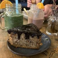 Vegan cake + yogi smoothie   at The Juicery Cafe in Pokhara