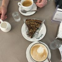 Soy latte macchiato and a chocolate / hazelnut pie. Very tastyy  at Dolce Pisa in Pisa