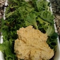 Side salad ordered with hummus and no dressing. January 2021.  at Taste Budd's Cafe in Red Hook