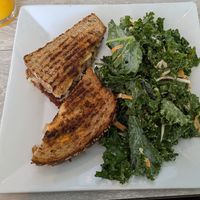Ruben with kale slaw and fresh squeezed OJ🤗 at Simply Green Cafe in Ramsey
