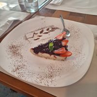 Cheesecake vegano de frutas vermelhas at Camaraderia Gastrobar in Belo Horizonte