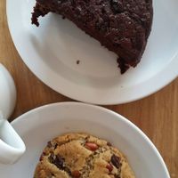 Rose/chocolate cake and peanut peanut butter chocolate chip cookie  at Herbivore in Cardiff
