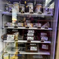 the stash of spreads, cheeses, and meats for sale   at Let Them Eat Vegan in Dunedin