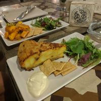 Tapas: tortilla de patata and pumpkin in sweet and sour sauce at Tarifa EcoCenter in Tarifa