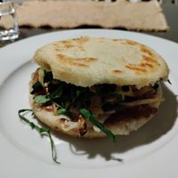 Arepa filled with peanut sauce, mushrooms and more at Sat Nam in Antigua