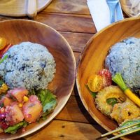 plate with vegetable tempura, a mini carrot, potato salad, and blue butterfly pea flower coconut rice at AT MARE in Zushi