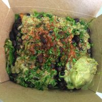 spicy rice bowl with avocado sauce at grabbagreen in Maple Grove