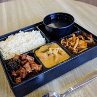 Bento box with stir fried gungpao mushroom, braised QQ tofu and nyonya curry potato with tofu puff at Greendot - Vivocity in Central Singapore