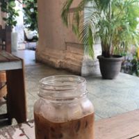 Oatmilk iced Latte  at The Mugshot Cafe in Penang