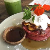 Berry pancakes and a green juice  at Cafe Organic in Canggu