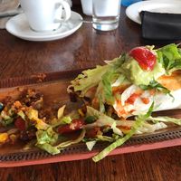 Half eaten vegan enchilada at In Food Bakery & Deli Restaurant in Jeffreys Bay