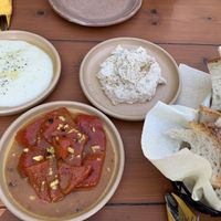 vegan starts - Humus, baked peppers with cumin and garlic, Skordalia (potato and garlic) - fresh bread from local baker    at New Mill Tavern in Palairos