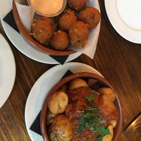 Patatas bravas and jalapeño corn bread tapas starter.  at Harmonium in Edinburgh