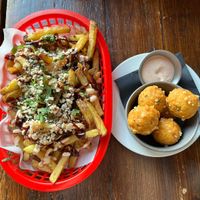 Vietnamese loaded chips. Jalapeno & cheddar cornbread hush puppies.  at Harmonium in Edinburgh