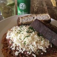 Chicken parmigiana with garlic bread  at Harmonium in Edinburgh