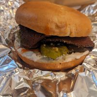 Vegan El Diablo bagel with cream cheese, pastrami, jalapenos, gherkins and Frank's hot sauce at New York Deli in Cardiff
