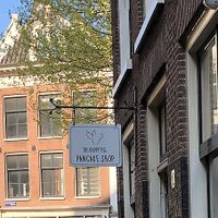 Sign out front    at The Happy Pig Pancake Shop in Amsterdam