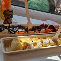 Amazing pancakes! We had the strawberries and chocolate-hazelnut sauce, and banana with maple syrup. Highly recommend. Be aware they only have oat milk as a dairy alternative. at The Happy Pig Pancake Shop in Amsterdam