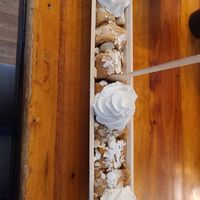 Apple pancake with vegan whipped cream at The Happy Pig Pancake Shop in Amsterdam