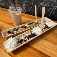 Vegan pancakes with hazelnut nut sauce (vegan) and vegan whipped cream   at The Happy Pig Pancake Shop in Amsterdam