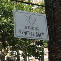 Sign at The Happy Pig Pancake Shop in Amsterdam