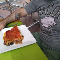 Happy customer about to have some vegan lassagne at De Francesco in Gran Canaria