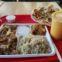 Smoked cauliflower,  Jackfruit, and mushroom curries. at Samosa House in El Segundo