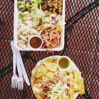 Hot plate with coconut rice, pineapple coleslaw, jackfruit bbq, salad greens and hot lava sauce (sweet chili).  at Loko Wraps in Kailua Kona