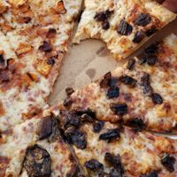 Sweet potato slices on the left and eggplant slices on the right at Pizza Bomba in Jerusalem
