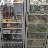 Refrigerated section with lots of vegan products like Taifun Tofu, vegan cheese, vegan burgers etc. at Nina Coop Store in Povoa De Varzim