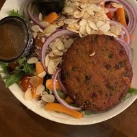 TOASTED ALMONDS SALAD, with a veggie burger   at Burger Village in Hicksville