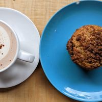 hot cocoa and Shoofly Bakery cardamom coffee cake muffin at Jet Black Coffee Company - Gateway in Portland