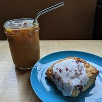cold brew and Bee's lemon scone with lemon icing at Jet Black Coffee Company - Gateway in Portland