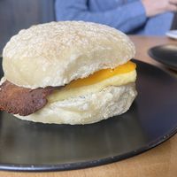 Breakfast sandwich with bacon and cheese   at Jet Black Coffee Company - Gateway in Portland