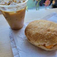 Latte and breakfast sandwich at Jet Black Coffee Company - Gateway in Portland