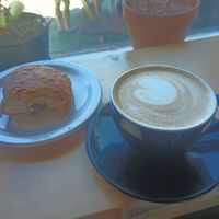 Pan au chocolate and a latte, sorta crappy picture but that's happycows charm! at Jet Black Coffee Company - Gateway in Portland