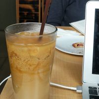 Iced coco-oat raspberry latte at Jet Black Coffee Company - Gateway in Portland