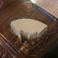 Half eaten key lime vegan cheesecake at Union Jack Pub in Indianapolis