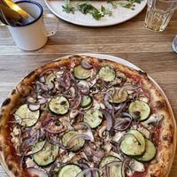 Garlicky (vegan) and calzone (vegetarian)  at The Flat in Exeter