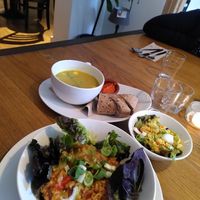 Yellow courgette soup, salad and Jambalaya at Logica Cafe Restaurant in Leiden