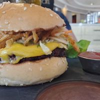 Vegan impossible burger with crispy onions at Wynn Hotel - Jardin in Las Vegas