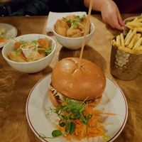satay burger, facon poppers, banana blossom goujons and fries at Two Wolves Kitchen in Brighton