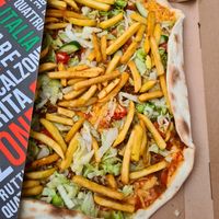 Vege Ali Baba pizza with chips, vöner and vegan cheese at Ali Baba in Turku