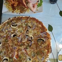Vöner with fries and vöner pizza (normal size) at Ali Baba in Turku