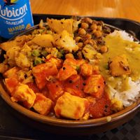 My "small plate" filled with rice, tofu in sauce, daal, potato curry, chickpea and spinach curry - yum! at Govinda's - North City in Dublin