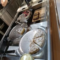 Vegan desert selection bottom left apple pie, top left banoffee and bottom right carob brownie at Govinda's - North City in Dublin